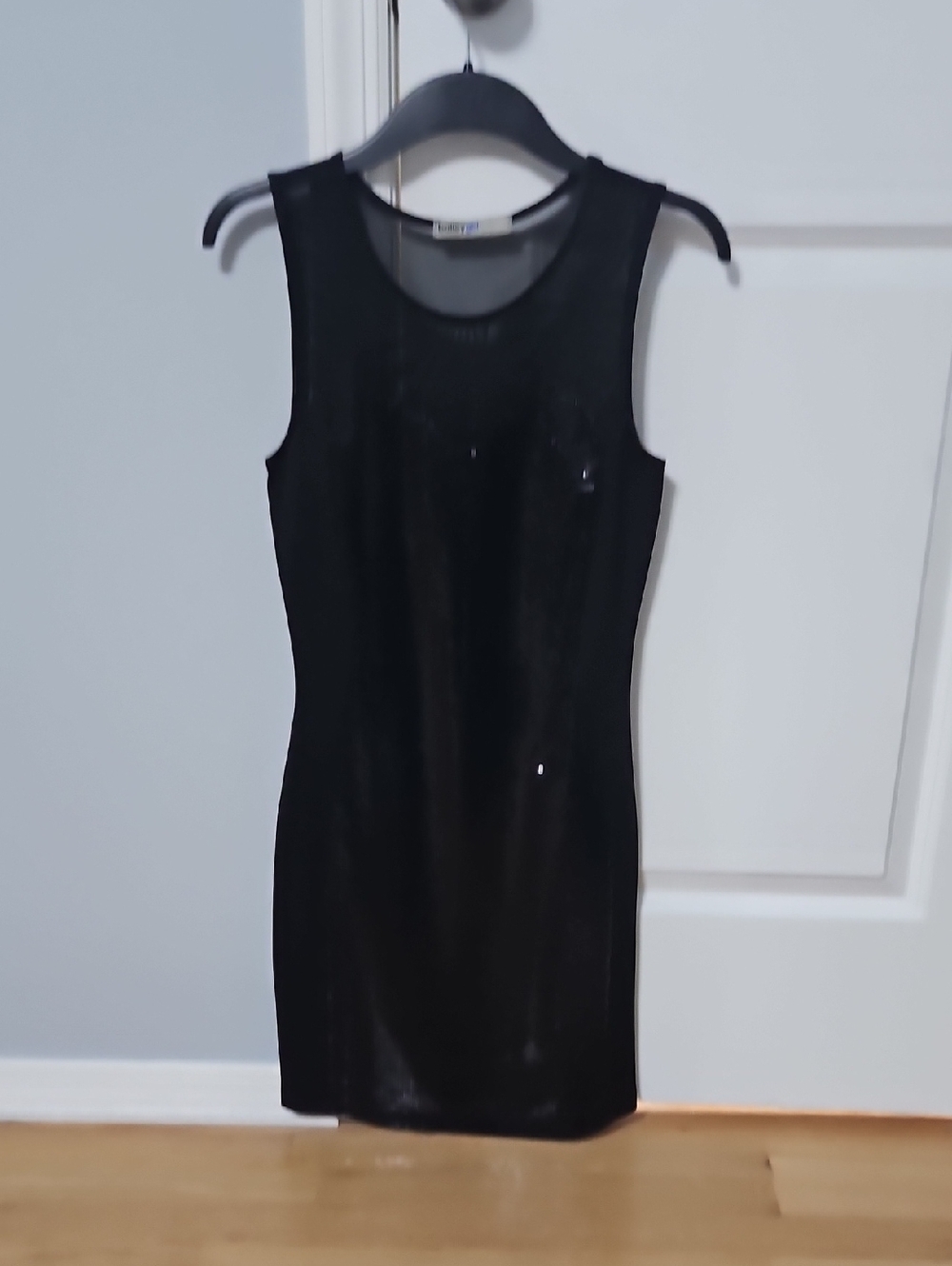Sleek Black Sleeveless Mini Dress